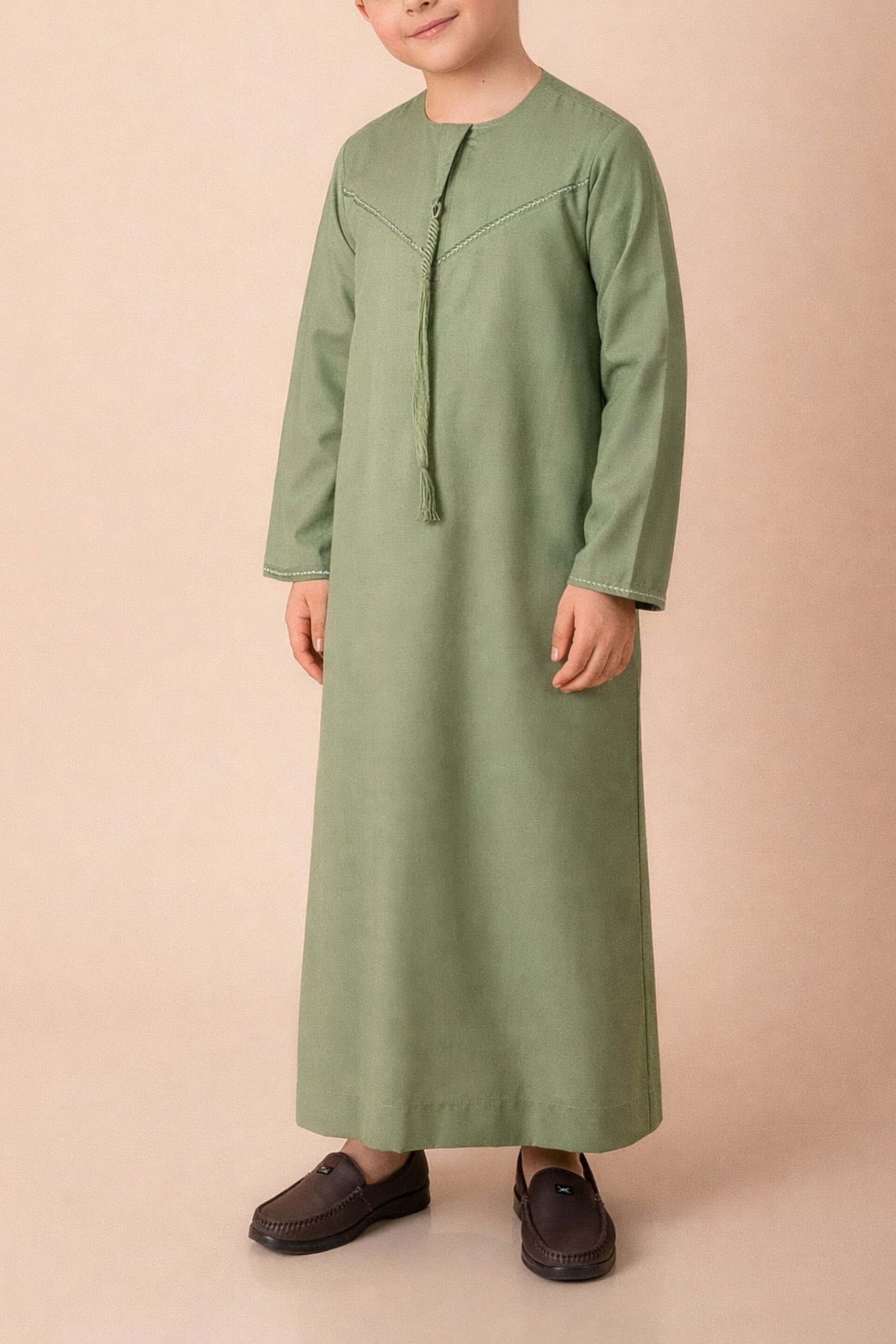 Premium Olive Green Emirati Kids Thobe with Braided V-Stitch & Tassel - Image 3 - Ruby Online