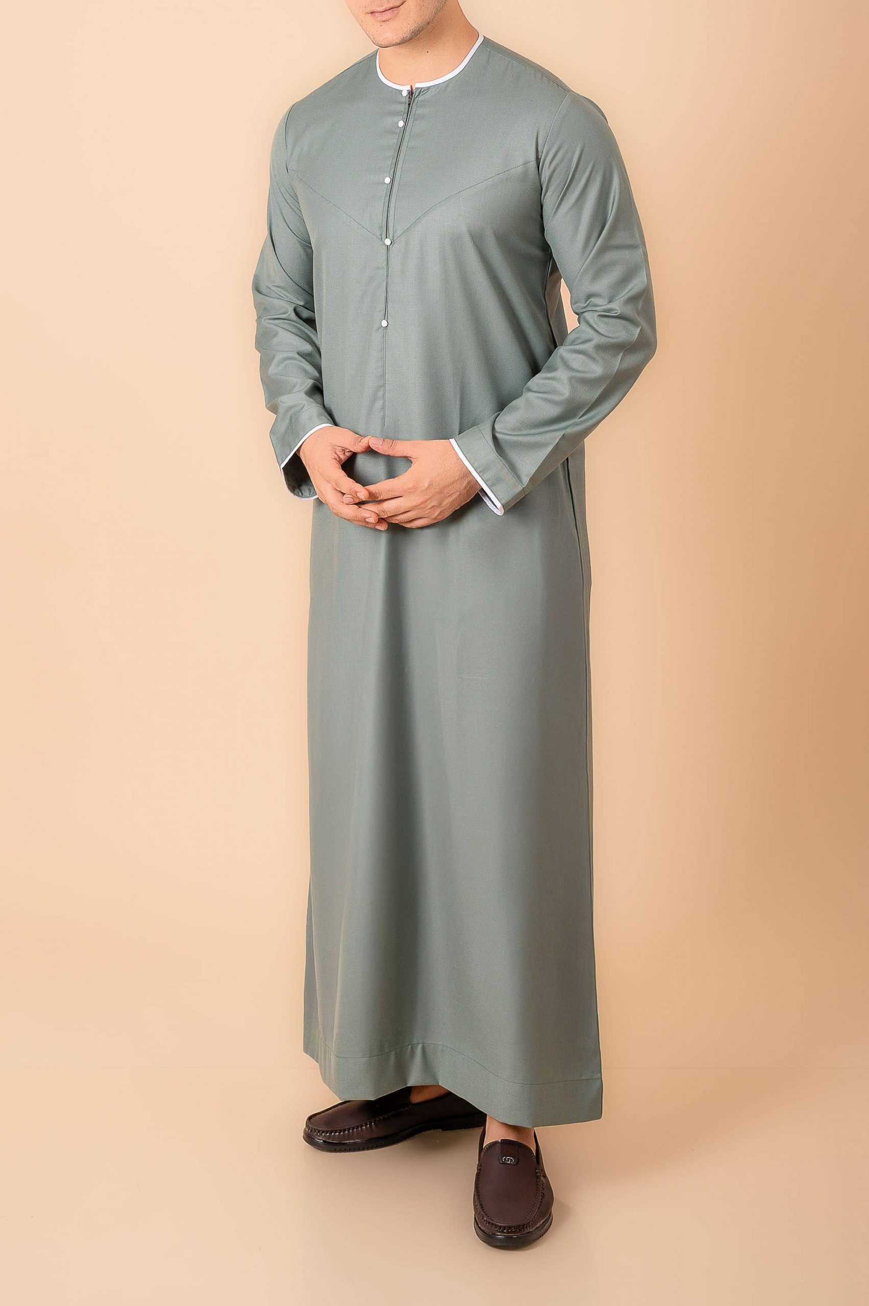 Premium Sage Green Emirati Thobe for Men with White Contrast Piping & Modern Panel Cut - Image 7 - Ruby Online