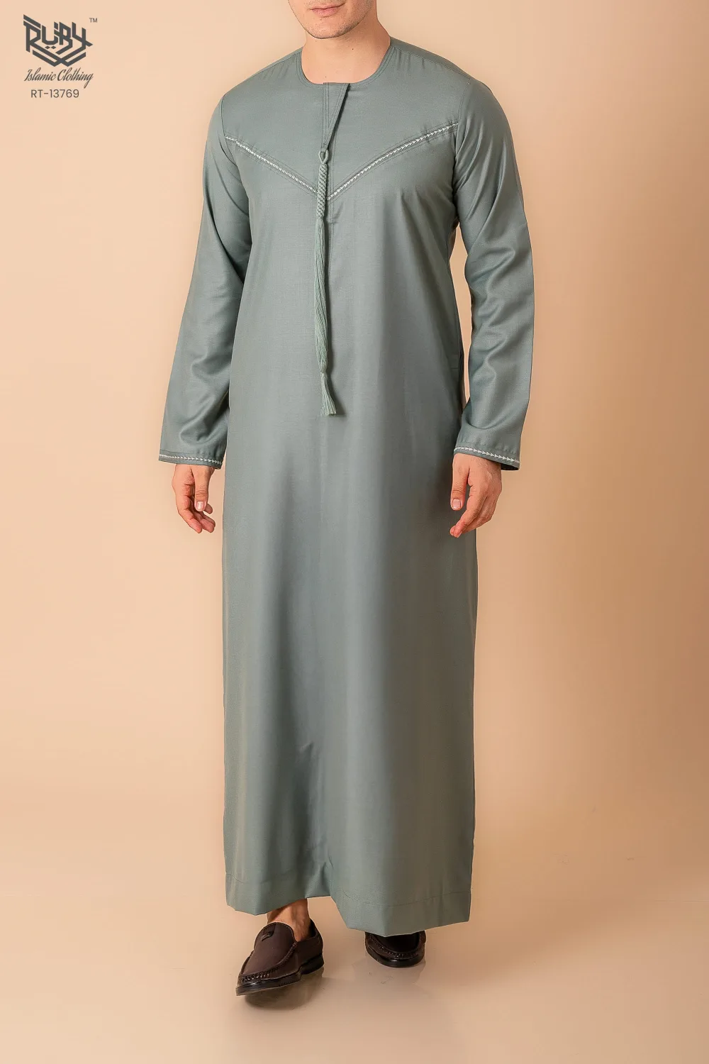 Premium Sage Green Emirati Tassel Thobe for Men with Silver Braided V-Panel – Modern Kandura Style